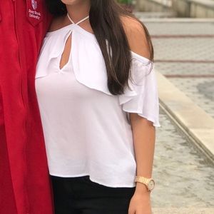 Off the shoulder high neck shirt.